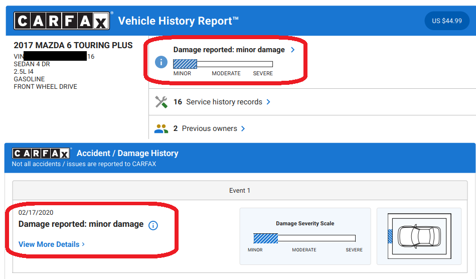 Mazda 6 CarFax showing minor damage